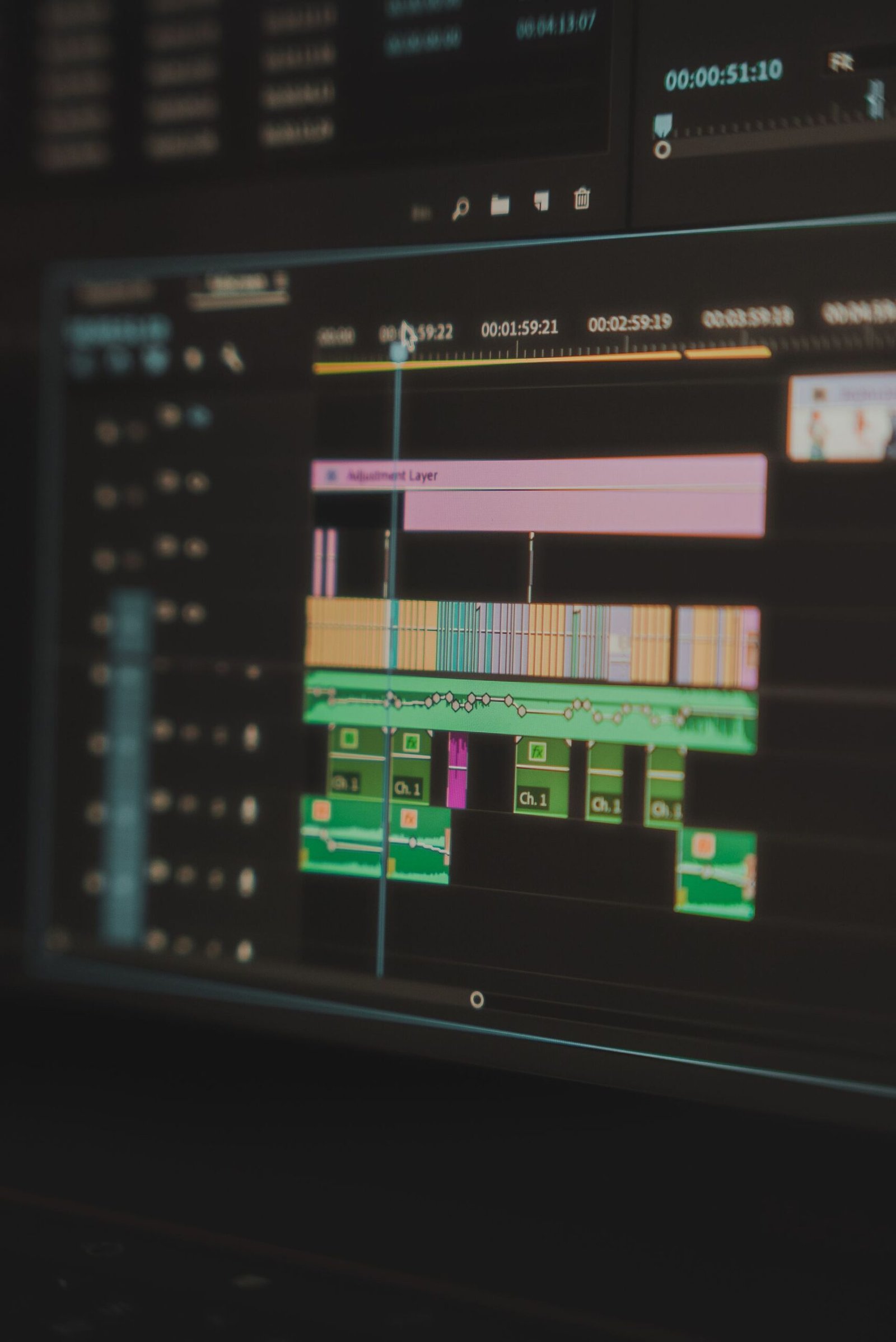 Detailed view of a video editing timeline on a computer screen.