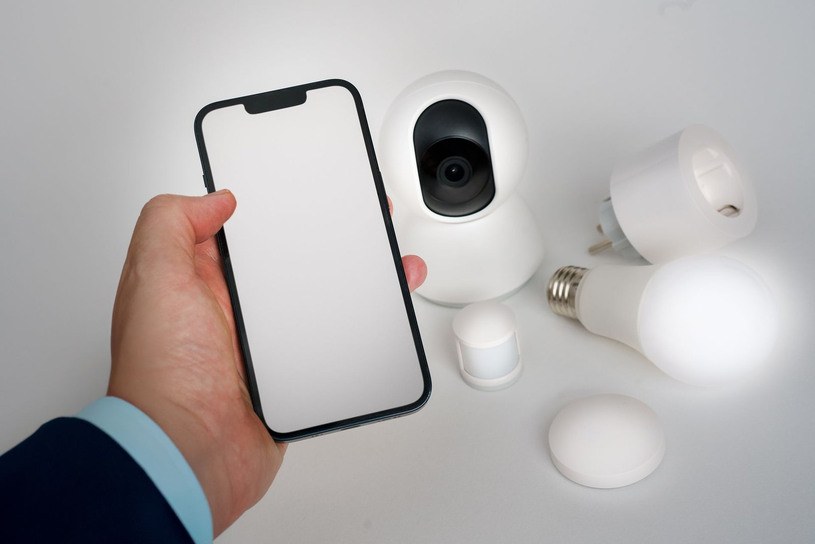 A video doorbell mounted beside a front door.