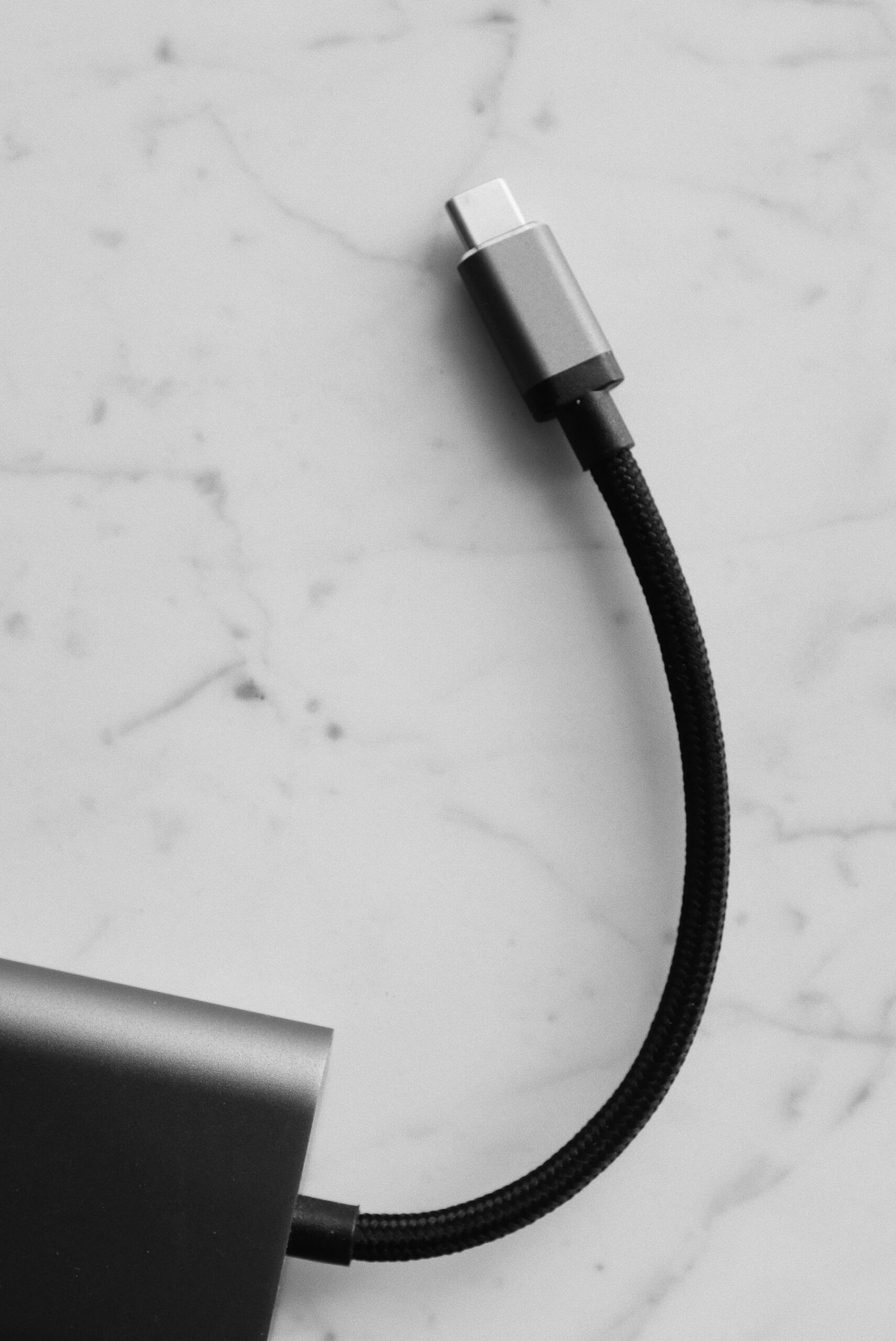 Several USB cables of different types lying side by side.