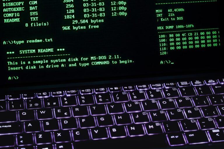 A terminal screen displayed on a laptop keyboard with vivid illumination.