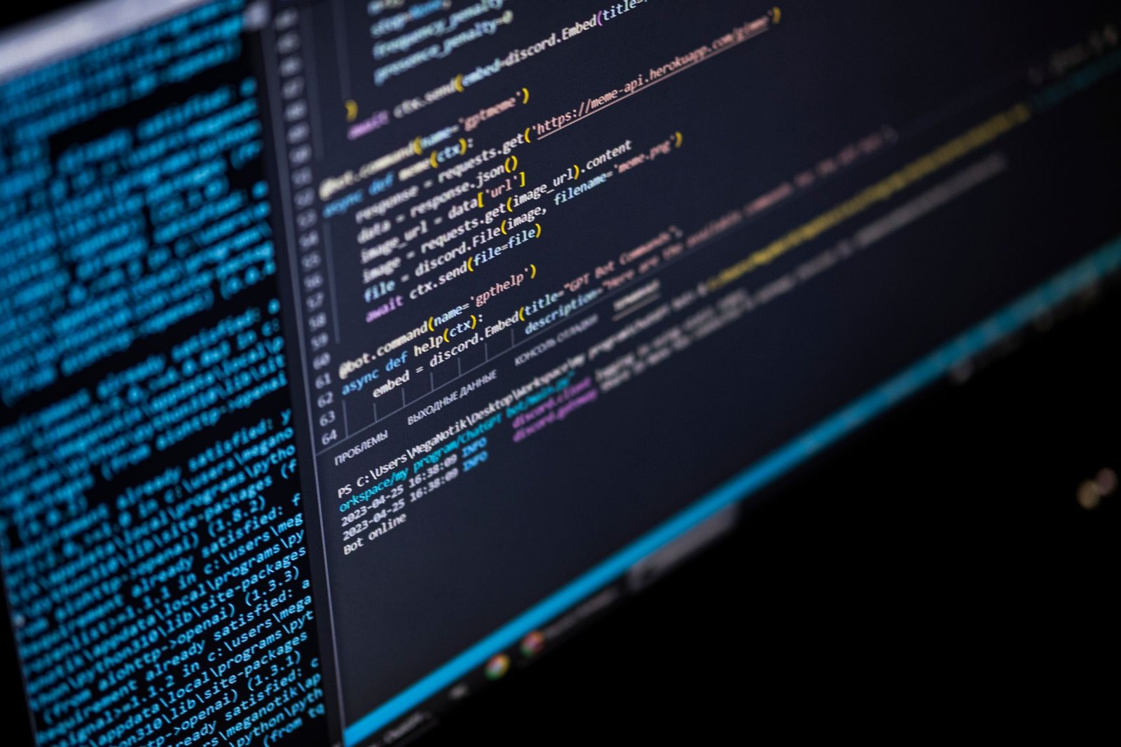 Close-up of a computer screen displaying HTML, CSS, and JavaScript code.