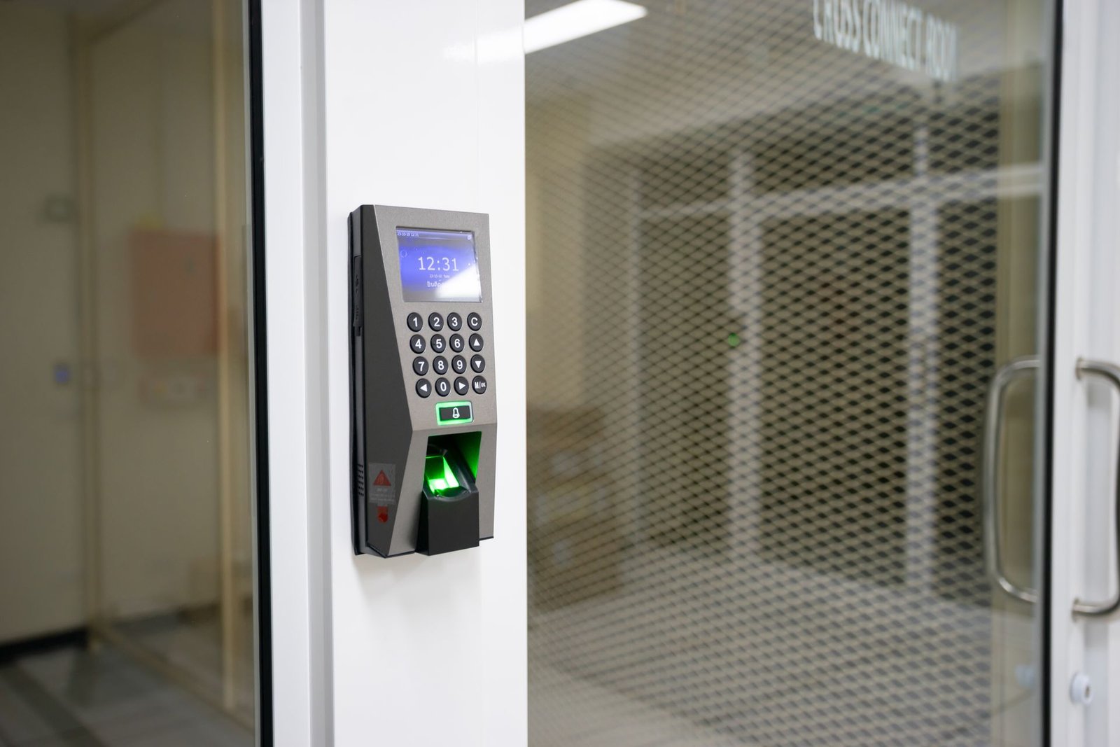 Modern fingerprint scanner for access control in an office.