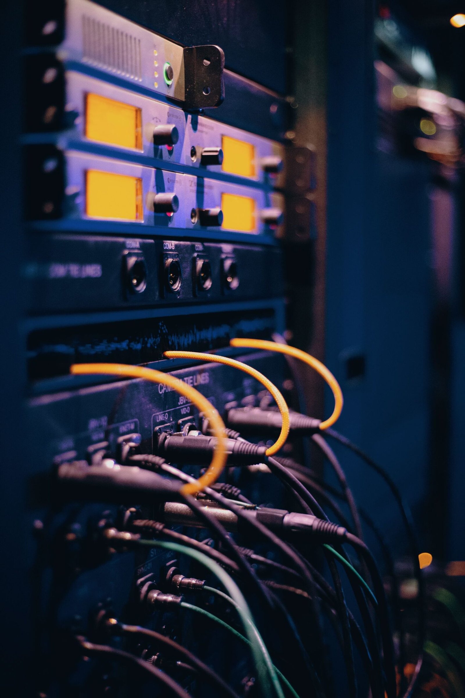 Ethernet cables plugged into a server rack.