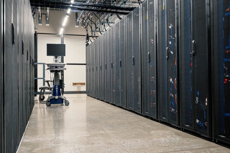 Rows of server racks inside a modern data center, representing the knowledge bases behind RAG systems.